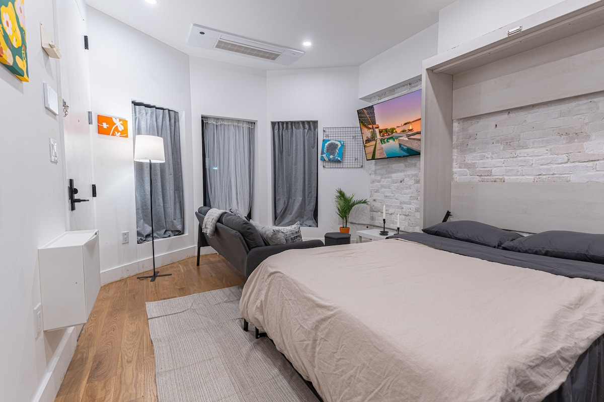 Stylish & Renovated Studio near Train W/D - Photo 1