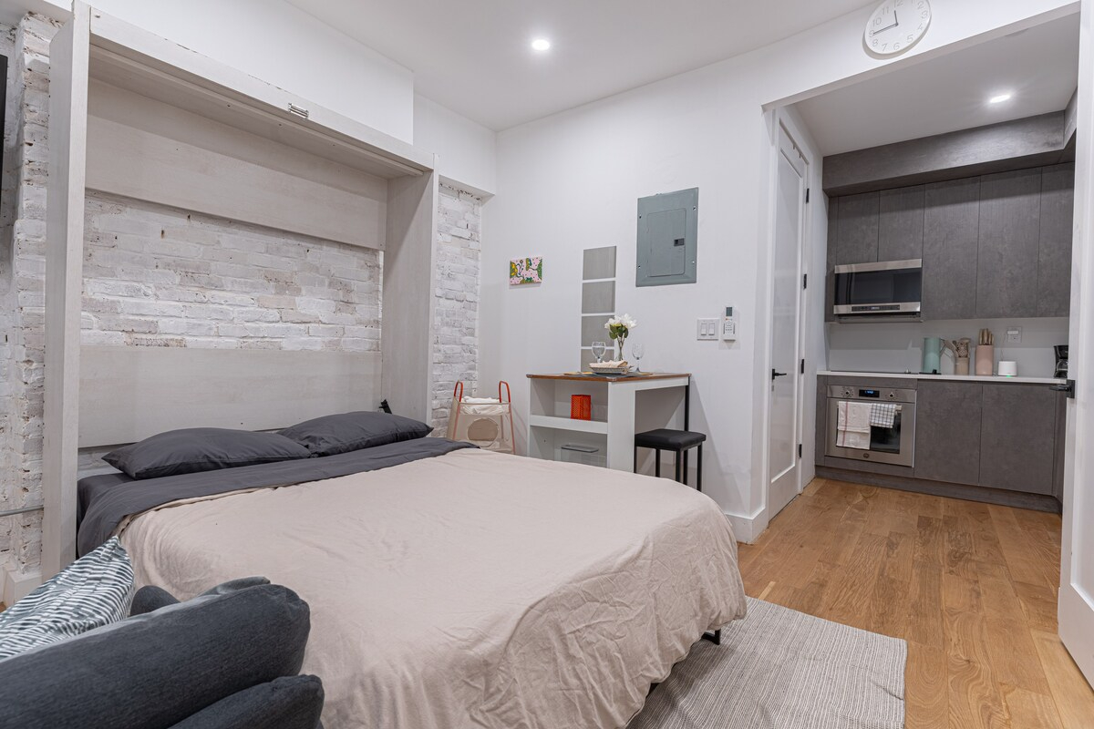 Stylish & Renovated Studio near Train  W/D - Photo 9