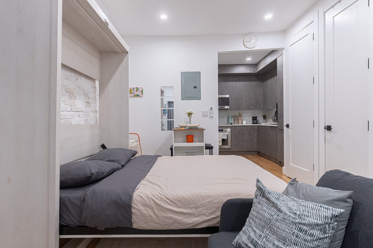 Stylish & Renovated Studio near Train  W/D - Photo 10