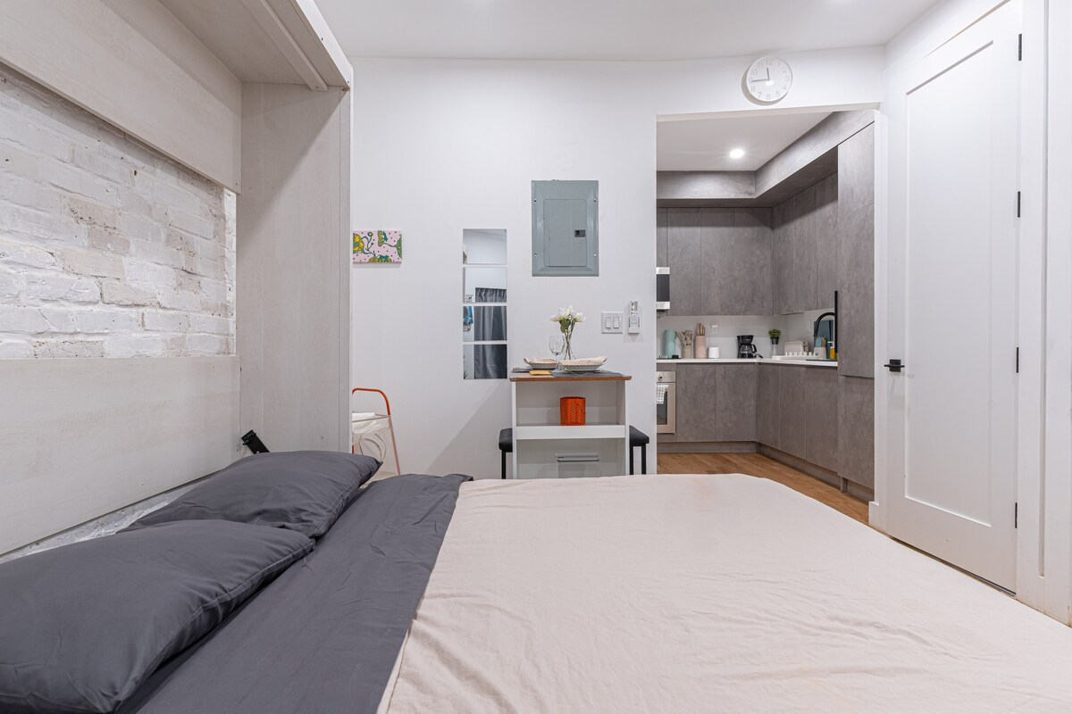 Stylish & Renovated Studio near Train  W/D - Photo 11
