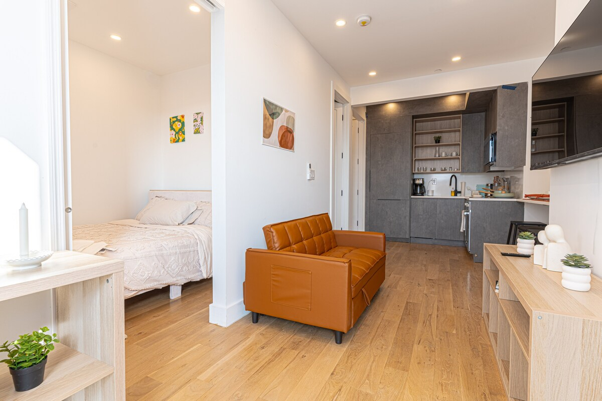Stylish & Renovated Studio near Train  W/D - Photo 9