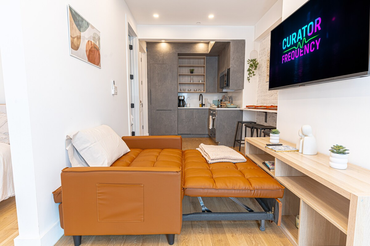 Stylish & Renovated Studio near Train  W/D - Photo 9