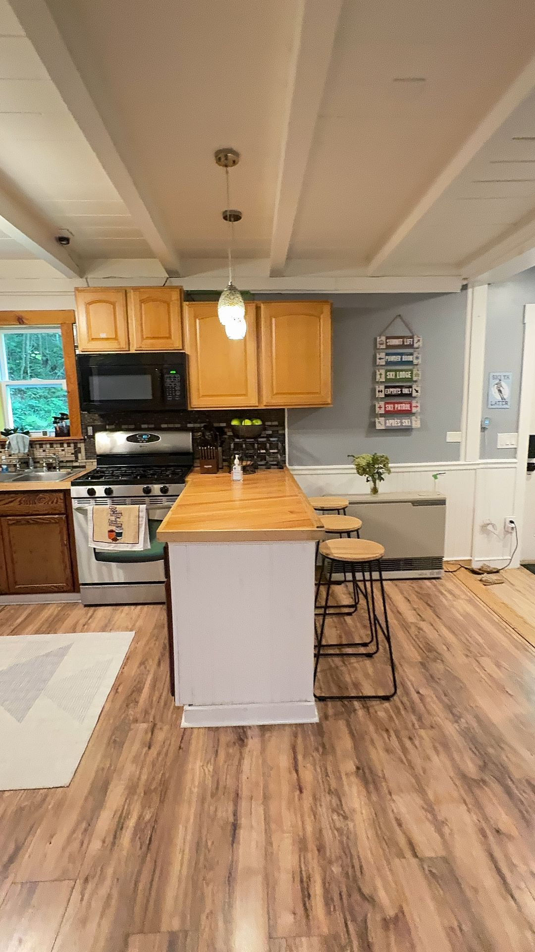Beautiful Furnished Home with Cozy Rustic Finishes - Photo 11