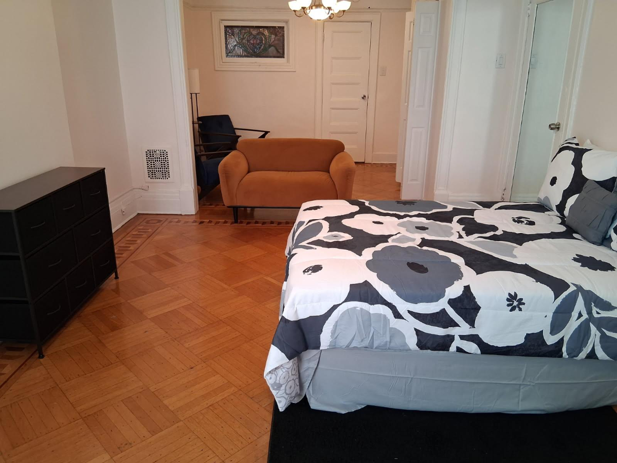 Spacious Furnished Room with Utilities Included Near Transit and Local Amenities - Photo 2