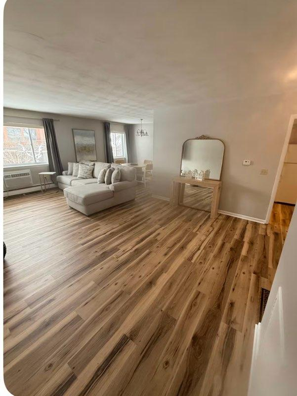 Fully Furnished 2BR Apartment with Utilities Included & Garage Parking - Photo 2