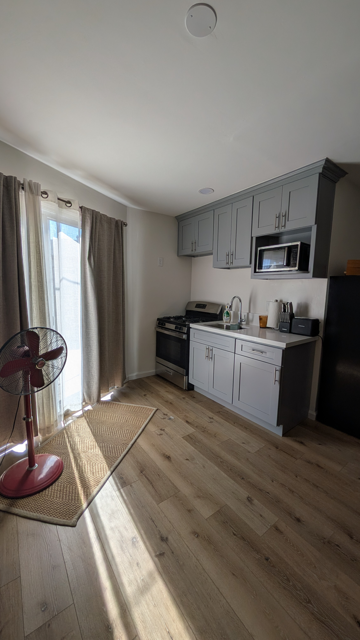 Quiet Studio Addition with Full Kitchen & Private Entrance - Utilities Included - Photo 6