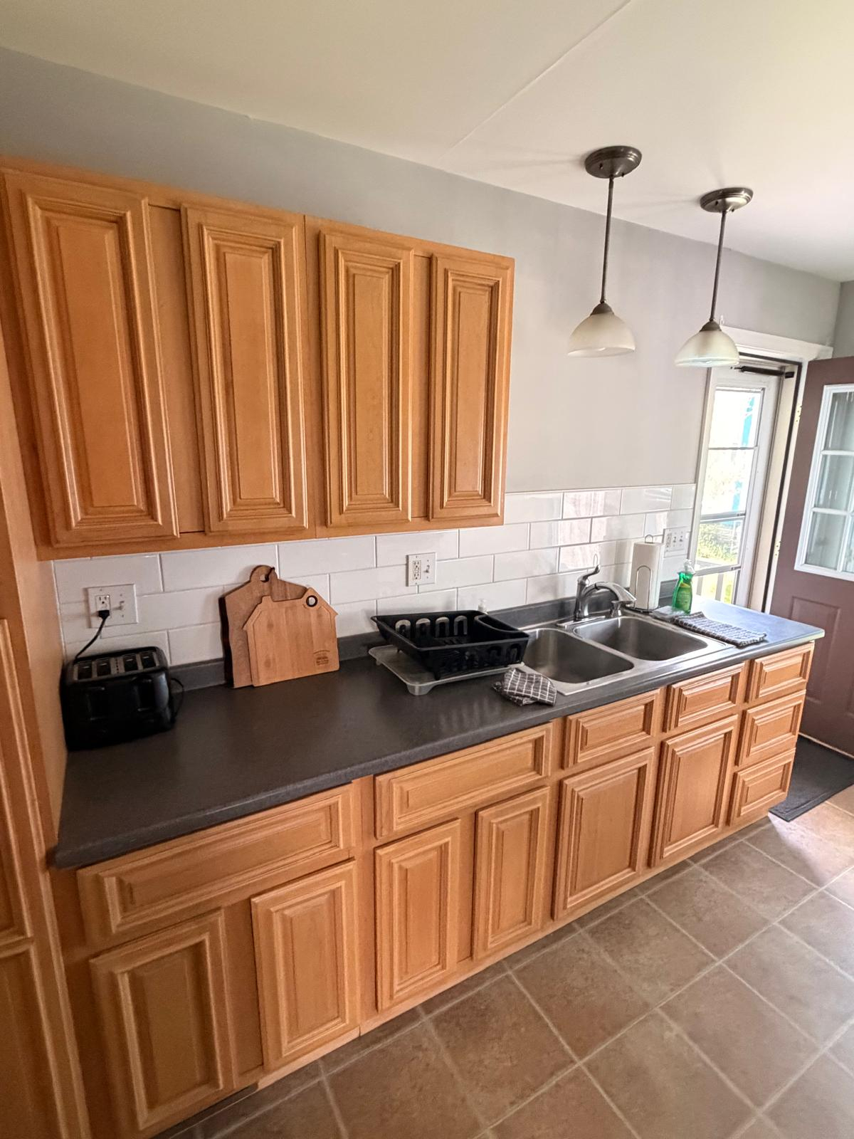 Furnished 3BR/1BA Apartment | Private Unit | Porch & Yard | Walk to A.O. Fox Hospital & Downtown - Photo 4