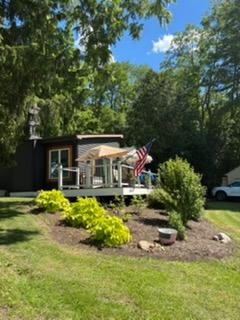 Peaceful Waterfront Retreat Featuring Private Room Shared Amenities And Prime Location - Photo 1