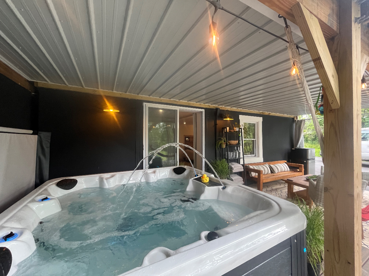 Private Suite with Covered Hot Tub & Peaceful Wooded Setting - Photo 4