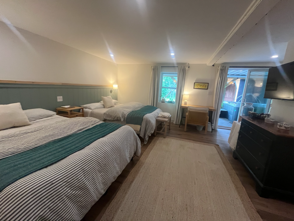 Private Suite with Covered Hot Tub & Peaceful Wooded Setting - Photo 9