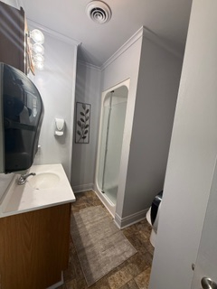 Charming 3-bedroom, 2-bath apartment with a private outdoor porch and stunning sunset views. Ideally - Photo 6