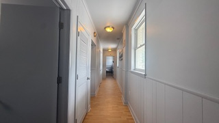 Charming 3-bedroom, 2-bath apartment with a private outdoor porch and stunning sunset views. Ideally - Photo 3