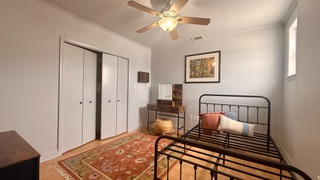 Charming 3-bedroom, 2-bath apartment with a private outdoor porch and stunning sunset views. Ideally - Photo 7