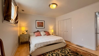 Charming 3-bedroom, 2-bath apartment with a private outdoor porch and stunning sunset views. Ideally - Photo 5