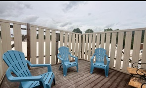 Charming 3-bedroom, 2-bath apartment with a private outdoor porch and stunning sunset views. Ideally - Photo 12