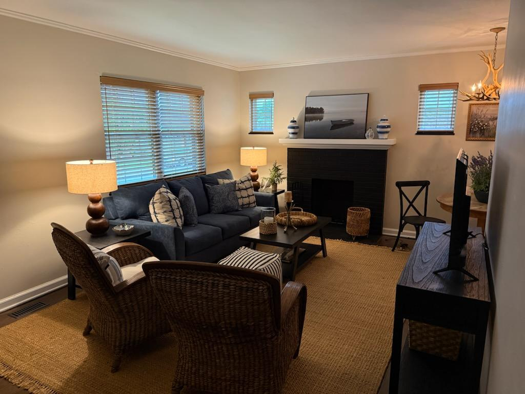 Thoughtfully Furnished 2BR Home with Modern Kitchen, Screened Porch & Utilities Included - Photo 5