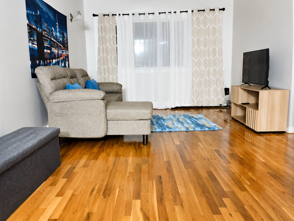 Inviting 3BR 1BA Upstairs Apartment | Fully Furnished | Utilities Included | Prime Location | Availa - Photo 1