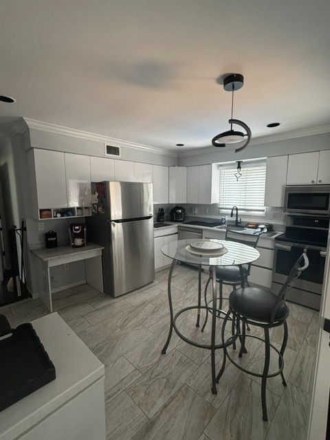 Pool & Patio, Close to everything where comfort meets convenience in the Heart of Centereach near St - Photo 6