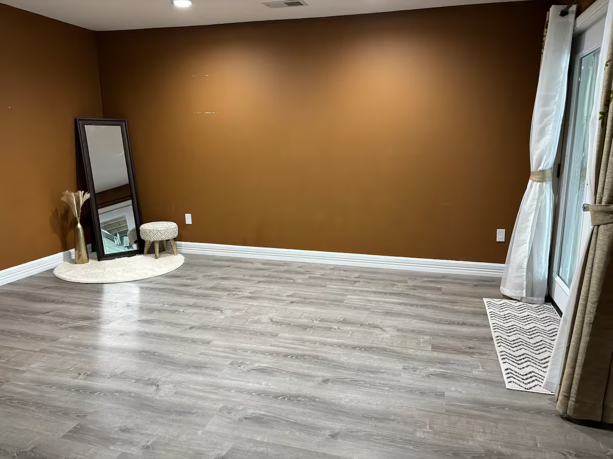 Comfortable Furnished Basement Retreat With Projector And Private Living Space - Photo 10