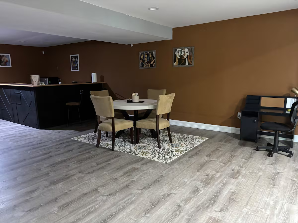Comfortable Furnished Basement Retreat With Projector And Private Living Space - Photo 3