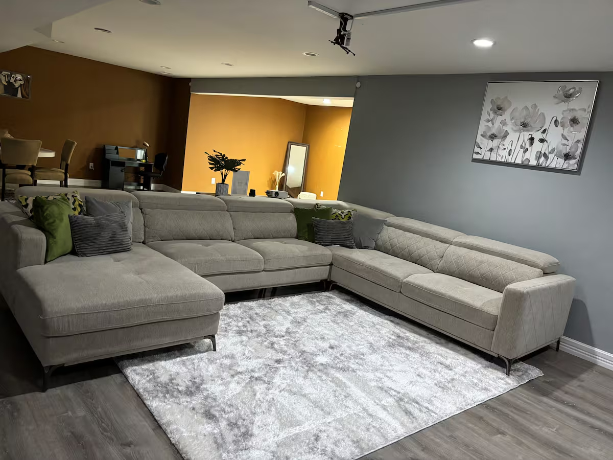 Comfortable Furnished Basement Retreat With Projector And Private Living Space