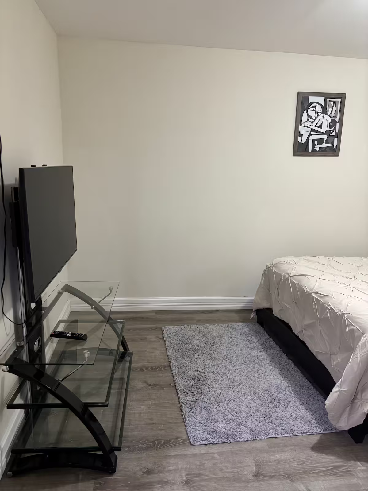 Comfortable Furnished Basement Retreat With Projector And Private Living Space - Photo 12