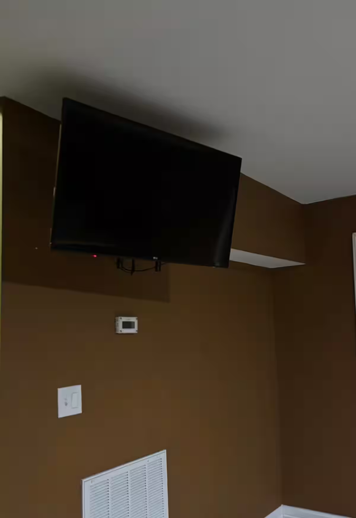 Comfortable Furnished Basement Retreat With Projector And Private Living Space - Photo 9