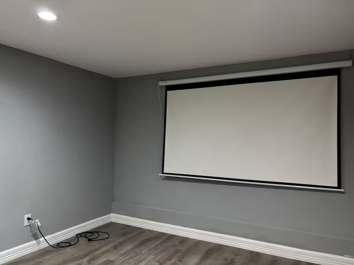 Comfortable Furnished Basement Retreat With Projector And Private Living Space - Photo 2