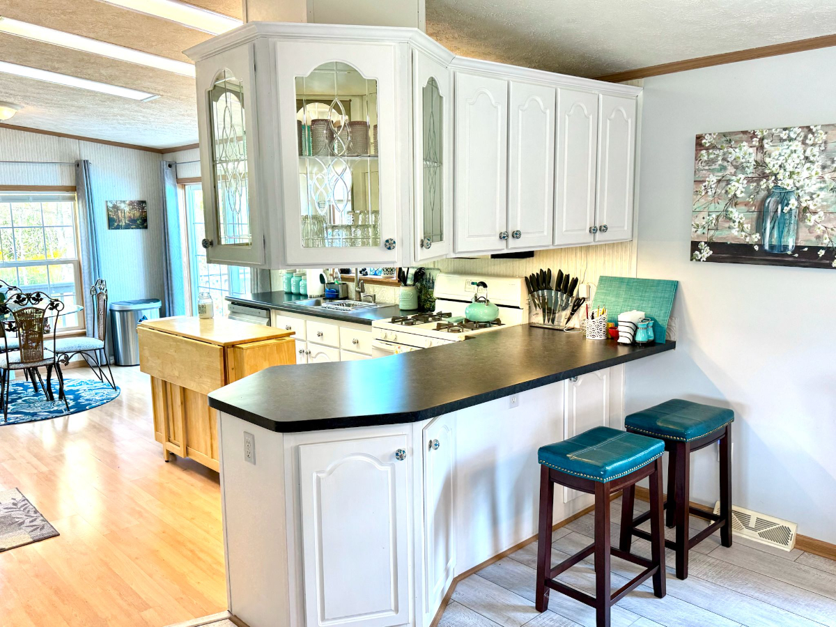 Comfortable 3-Bedroom Home with King Primary Suite, Ample Parking & Prime Walkable Village Location - Photo 7
