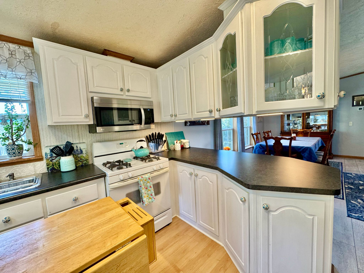 Comfortable 3-Bedroom Home with King Primary Suite, Ample Parking & Prime Walkable Village Location - Photo 8