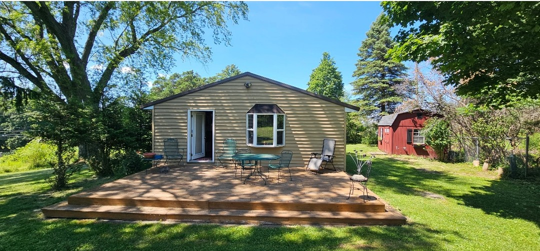Fully Furnished 2-Bedroom Home with Attached Garage and Outdoor Space - Photo 1