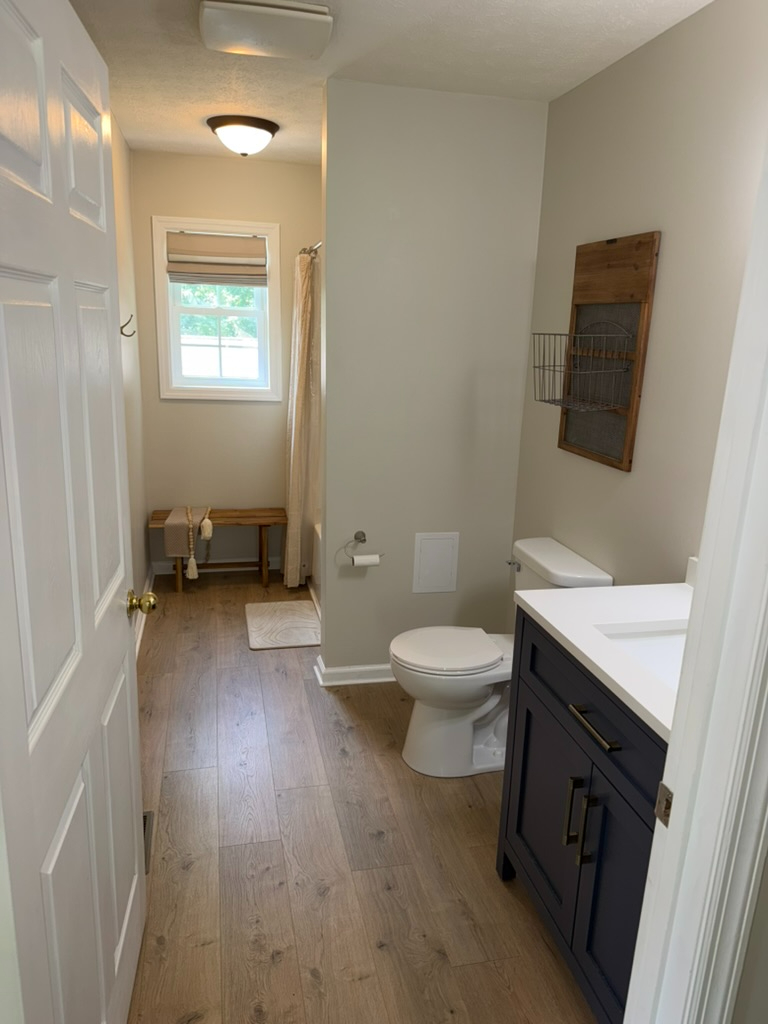 Charming 3BR Ranch with Spacious Deck Near Hospitals - Photo 10