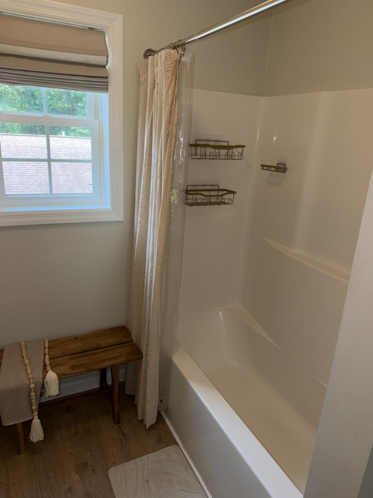 Charming 3BR Ranch with Spacious Deck Near Hospitals - Photo 11