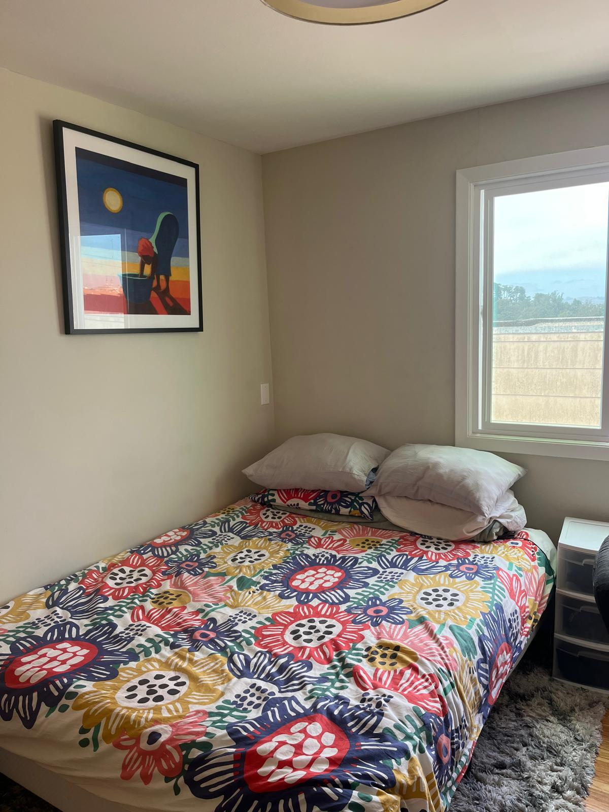 A stylish bedroom in a quiet apartment with sweeping panoramic views of San Francisco - Photo 1