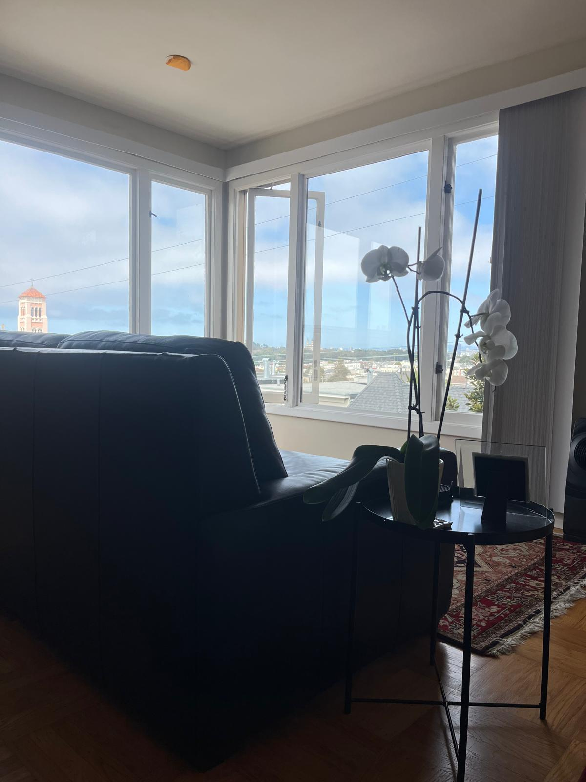 A stylish bedroom in a quiet apartment with sweeping panoramic views of San Francisco - Photo 6