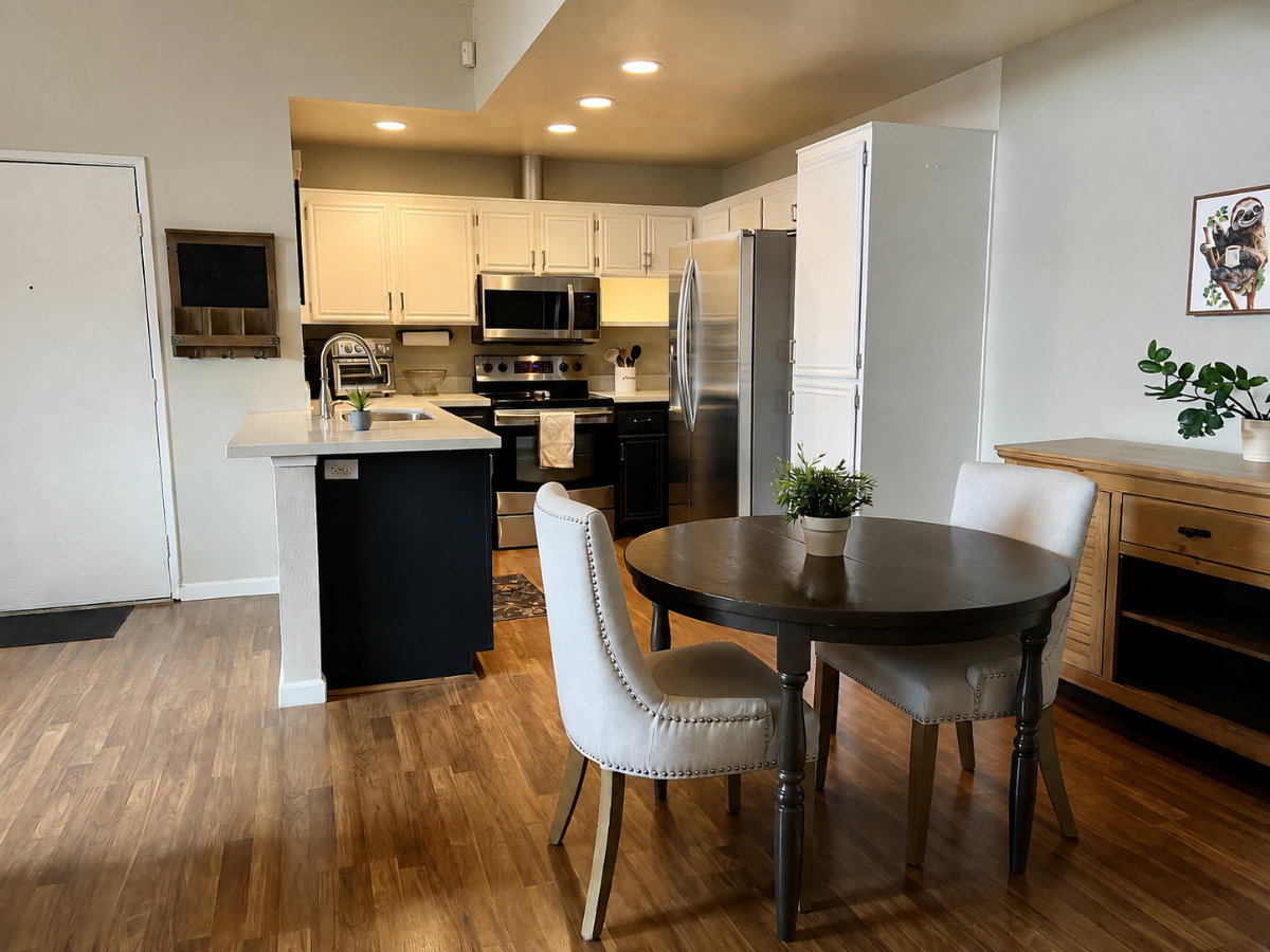 Bright & Updated 1BR Condo | Balcony, Pool + In-Unit Laundry - Photo 2