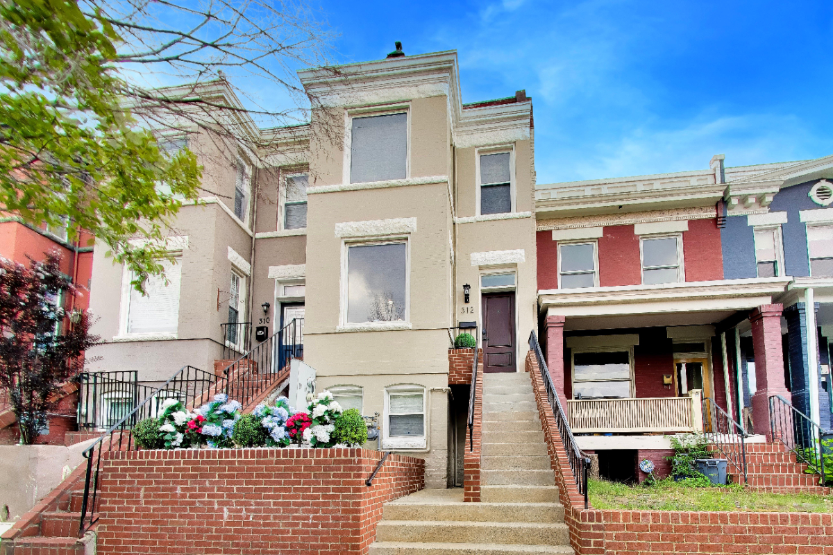 Wonderful 3 Bedroom with Exposed Brick aesthetic - Your Washington DC Retreat - Photo 2