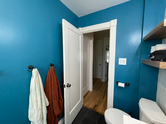 Furnished private bedroom in cozy, updated home - Photo 11