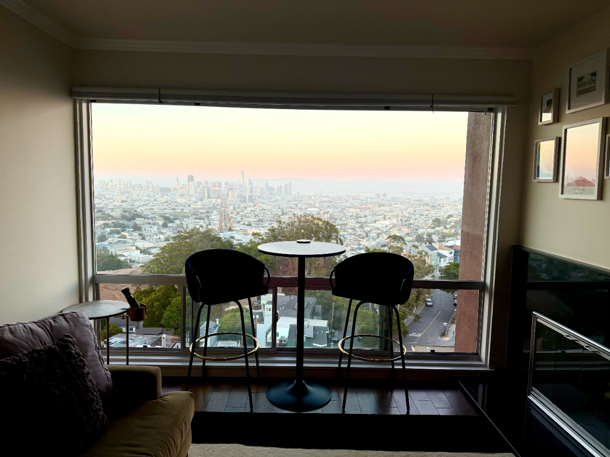 Top-Floor Clarendon Heights Condo | Panoramic SF Views, Parking & In-Unit Laundry - Photo 1