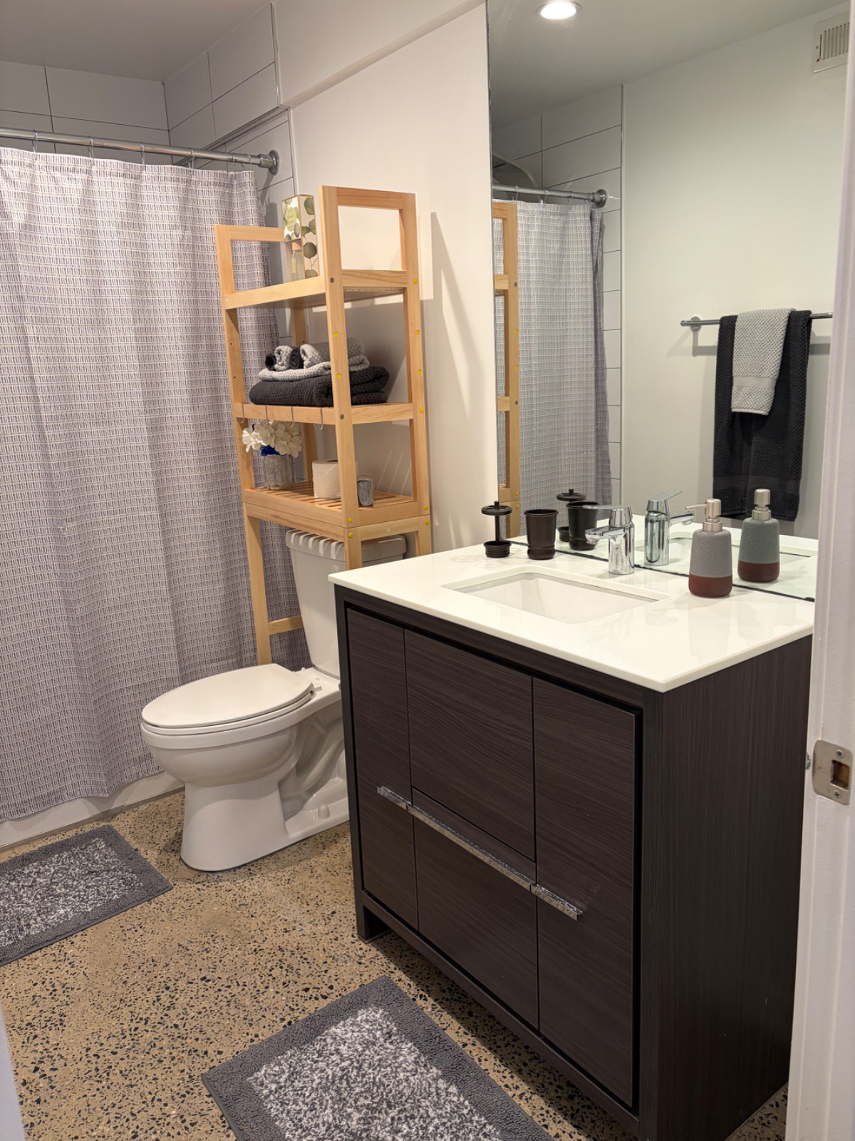 Fully Furnished Garden Apartment Near Fort Totten | Parking & Backyard Access - Photo 3