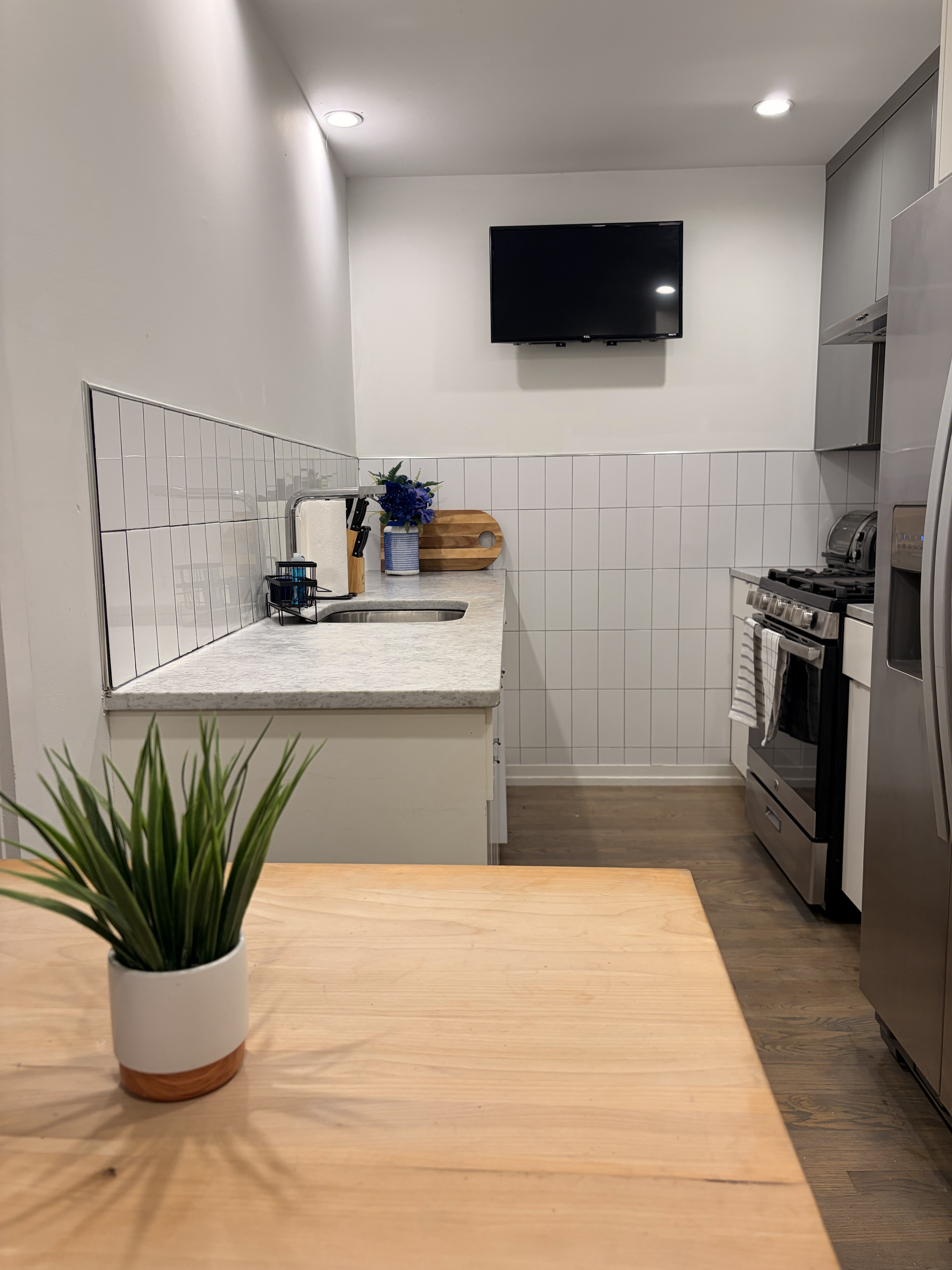 Fully Furnished Garden Apartment Near Fort Totten | Parking & Backyard Access - Photo 9