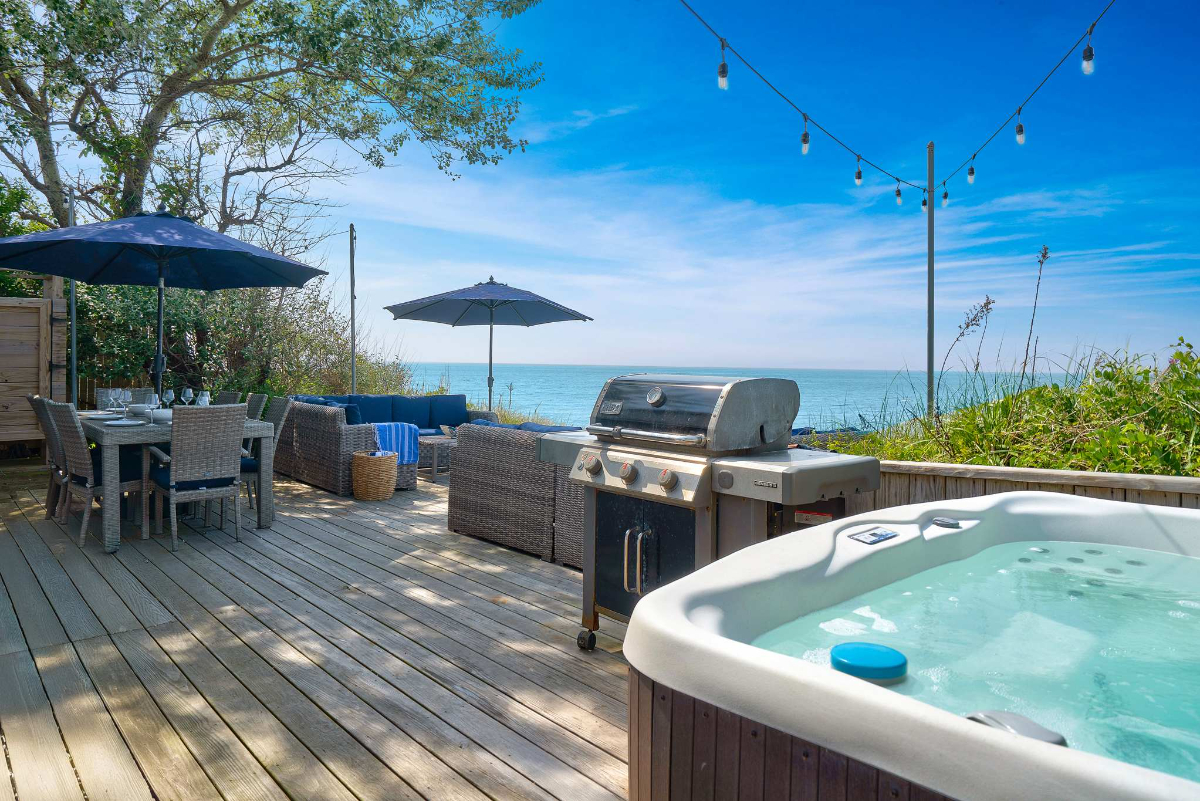 Chic Waterfront Beach House with Hot Tub - Photo 1