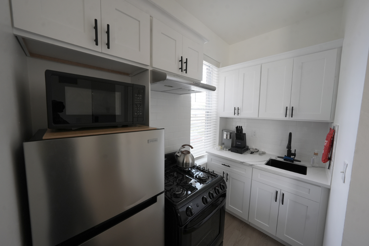 Modern Serene 1BR Near Jacobi & Montefiore | Balcony - Photo 9