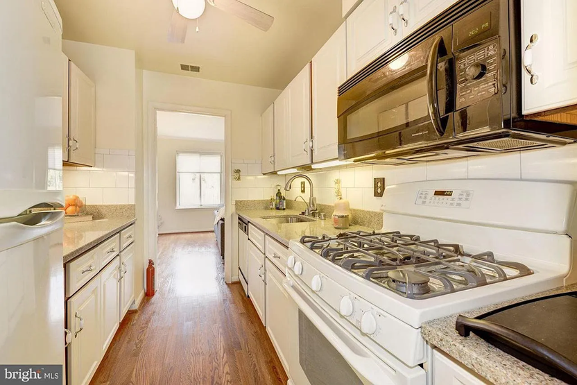 Spacious 4BR-3.5BA House w/ Parking, Fenced Patio | Walk to Metro & Downtown Takoma and Silver Sprin - Photo 9