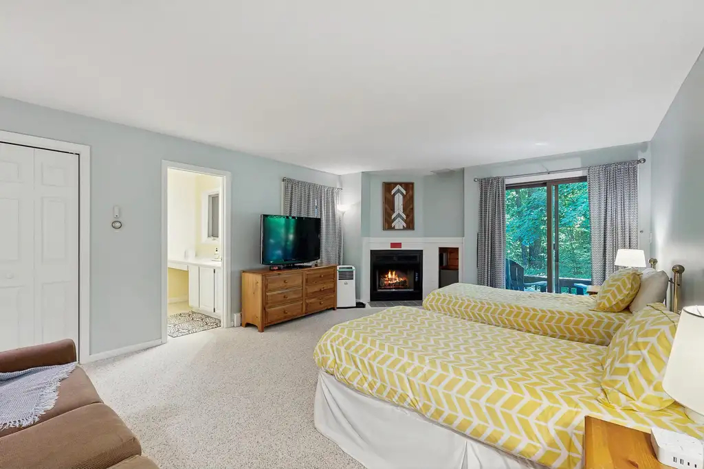 Updated Three-Level Condo | Private Wooded Setting | 2-Bedroom Suites | Dedicated Workspace | Two De - Photo 8