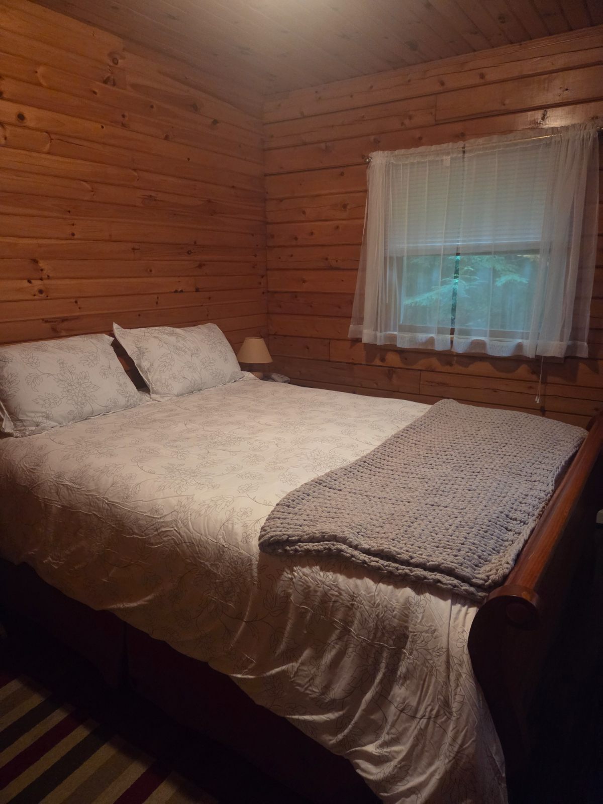 Peaceful Lakefront Home with Cozy Fireplace & Utilities Included - Photo 5