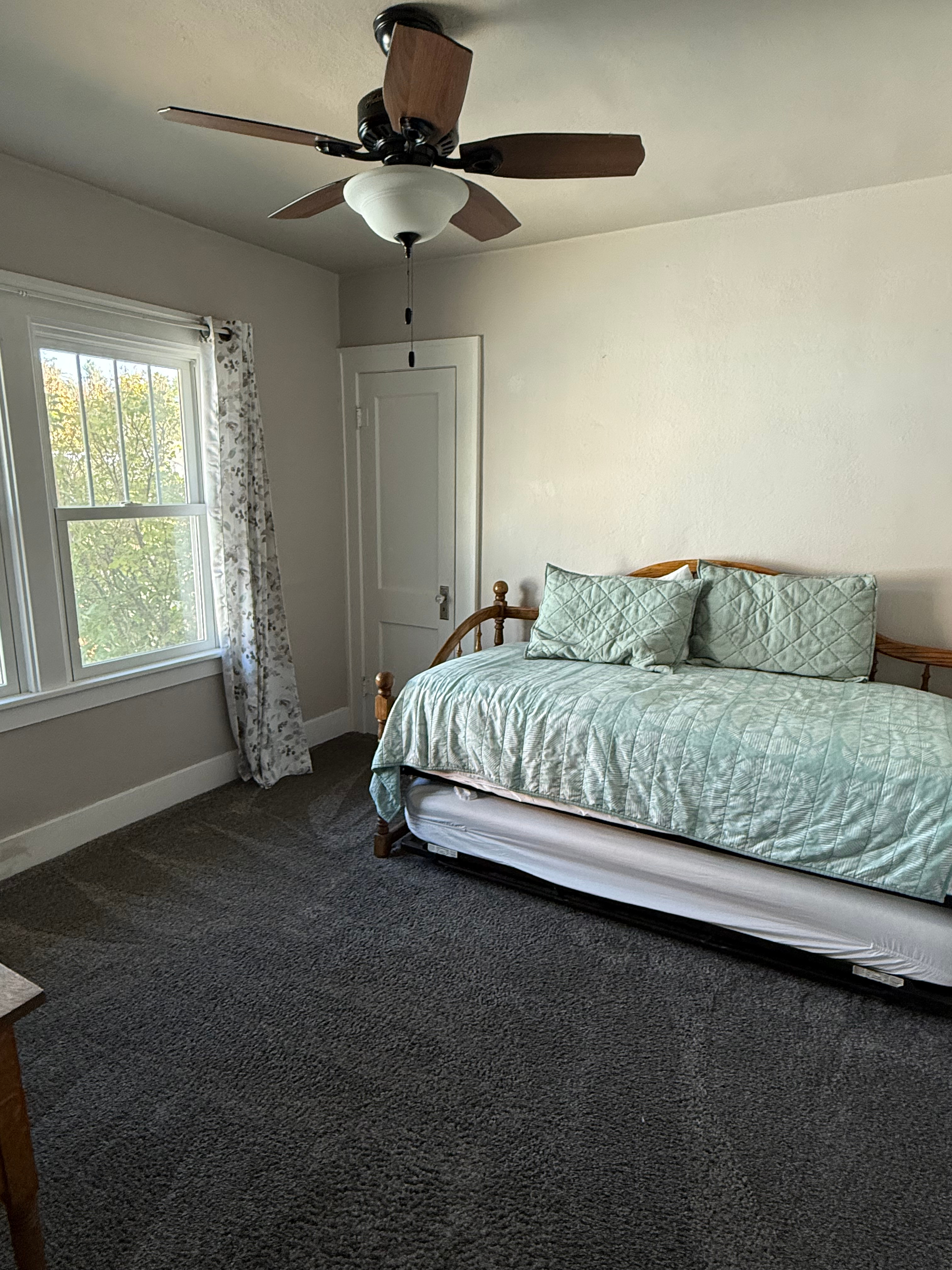 Spacious 4-Bedroom Furnished Home with Fenced Backyard - Photo 8