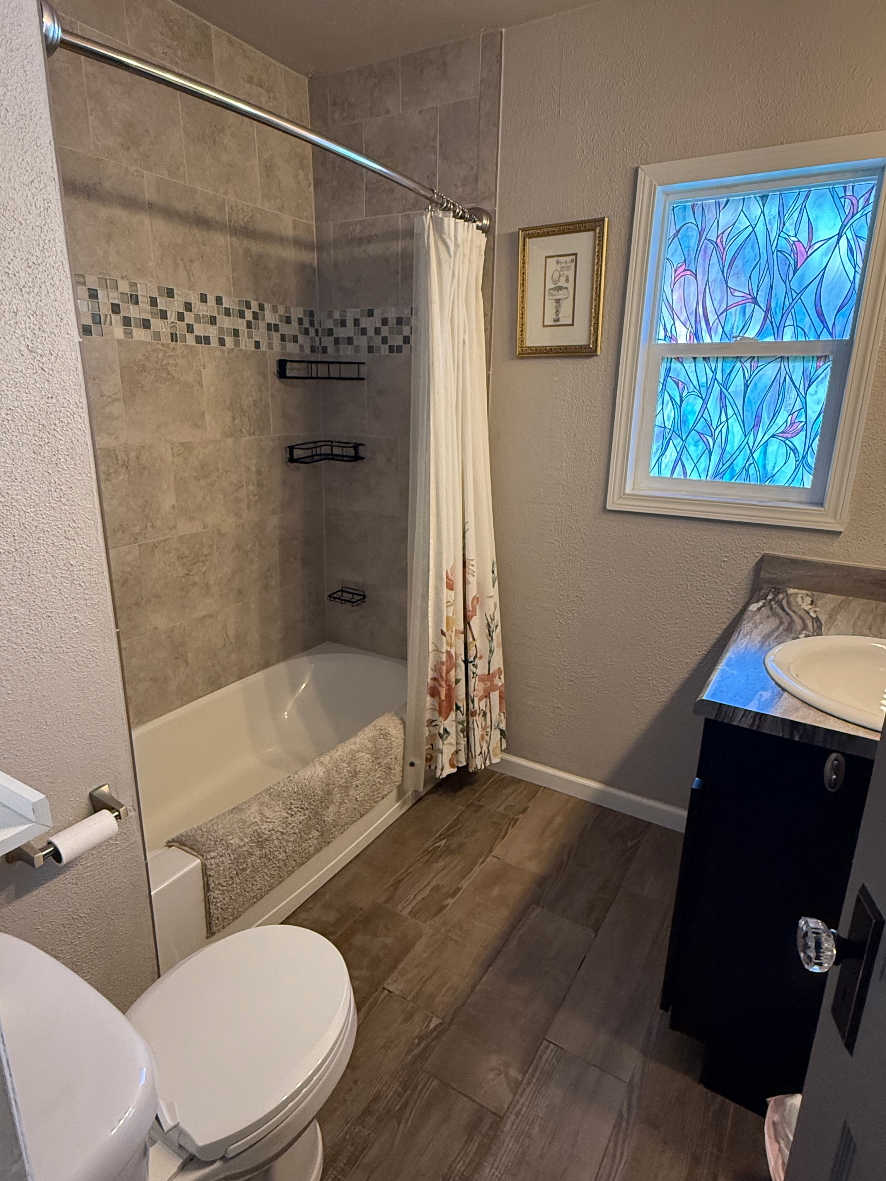 Spacious 4-Bedroom Furnished Home with Fenced Backyard - Photo 7