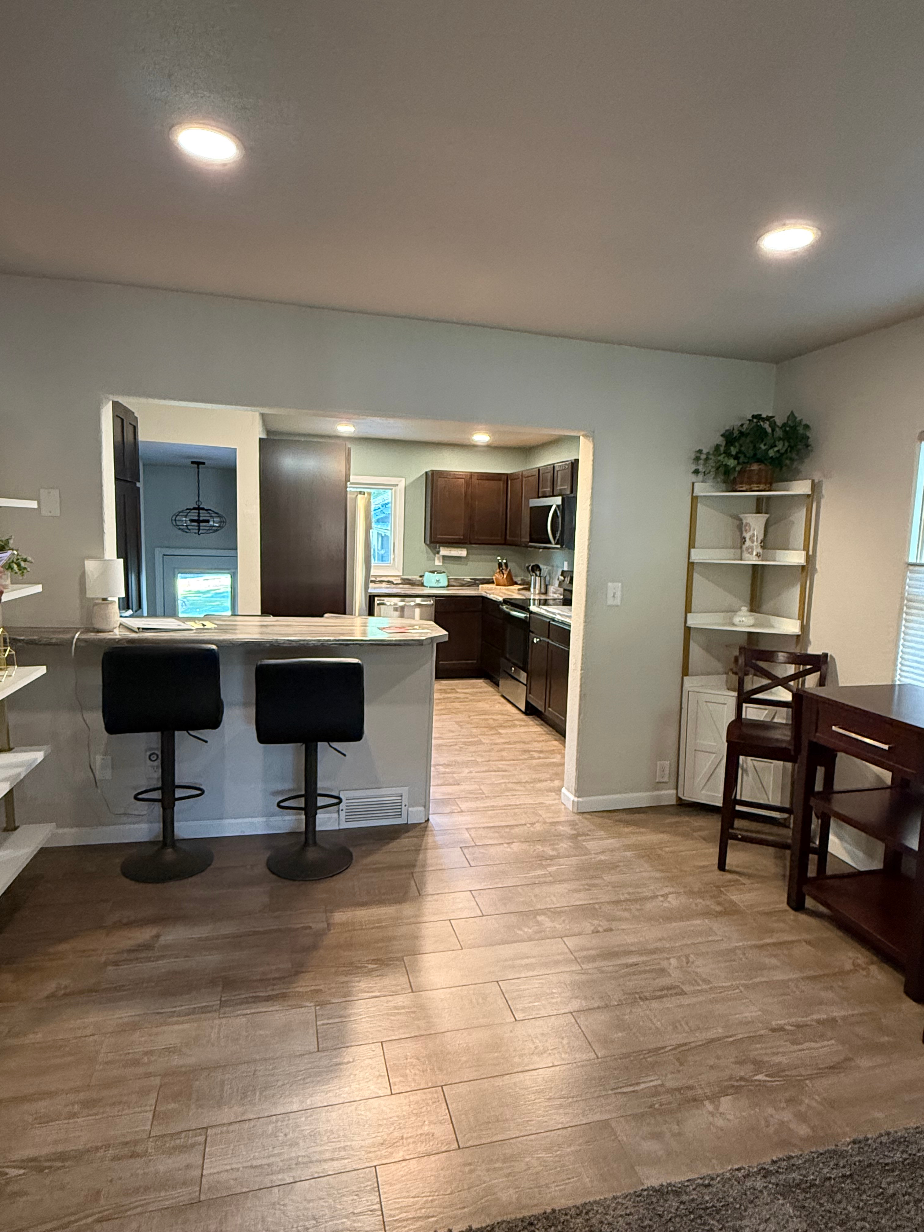 Spacious 4-Bedroom Furnished Home with Fenced Backyard - Photo 4