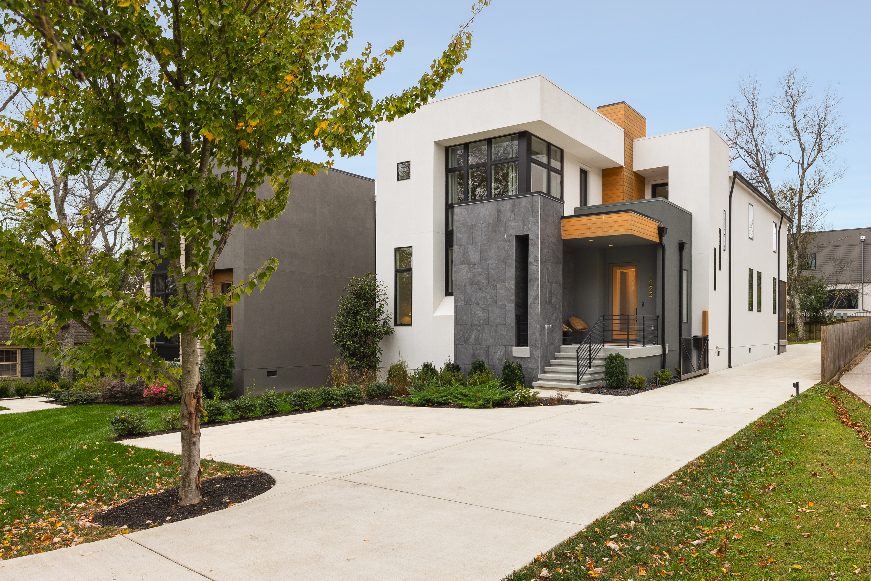 Modern Beauty in Green Hills with 2 Patios and Garage